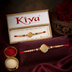 ALVENZA Golden Swastik AD Stone Rakhi with Turquoise-Red Meenakari and Pearl Beads