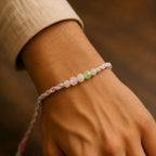 ALVENZA Pastel Pearl Bracelet Rakhi with Soft Pink Green Beads and Delicate Designer Beauty