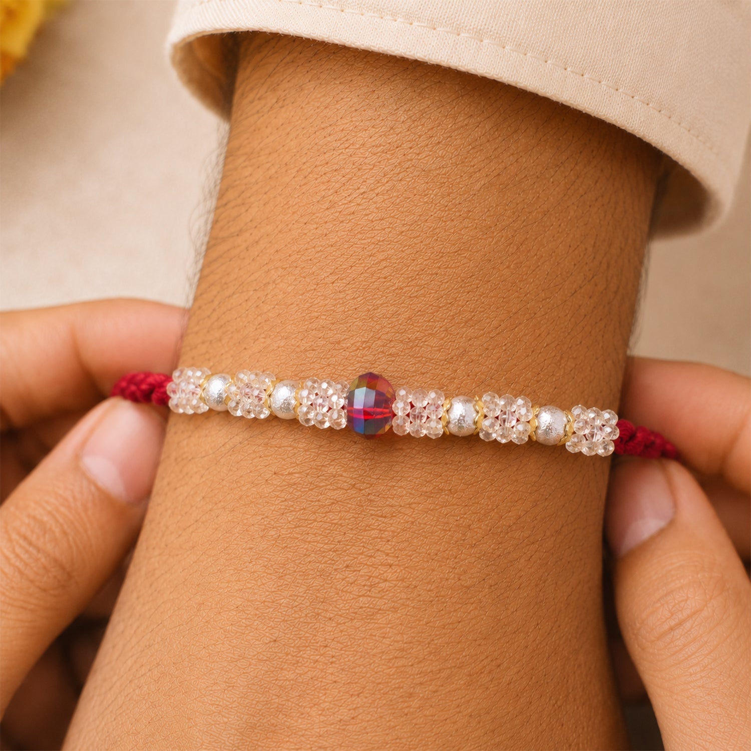 ALVENZA Graceful Pastel Bracelet Rakhi with Silver Centre and Delicate Raksha Bandhan Beauty