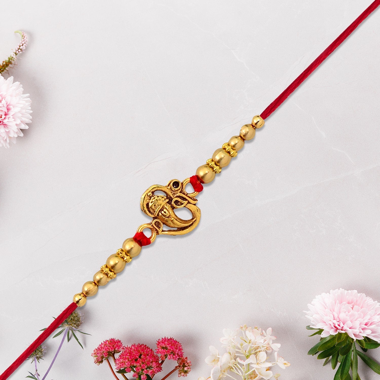 ALVENZA Ganesha Rakhi – Divine Blessings & Traditional Design