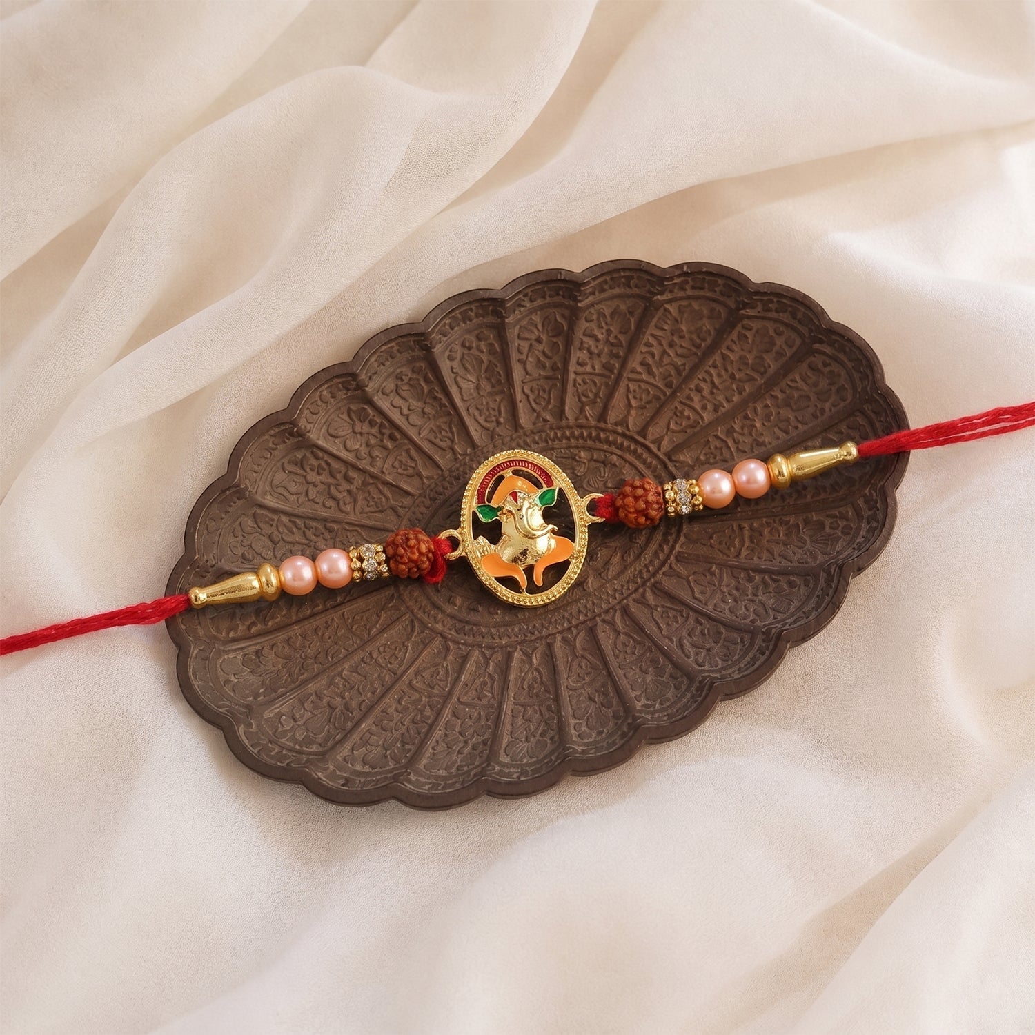 ALVENZA Traditional Ganesha Rakhi – Elegant spiritual festival accessory