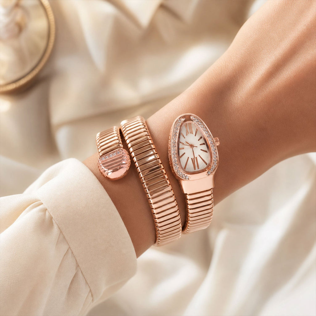 Rose Gold Snake Chain Bracelet Watch with Oval Dial Crystal Border for Women