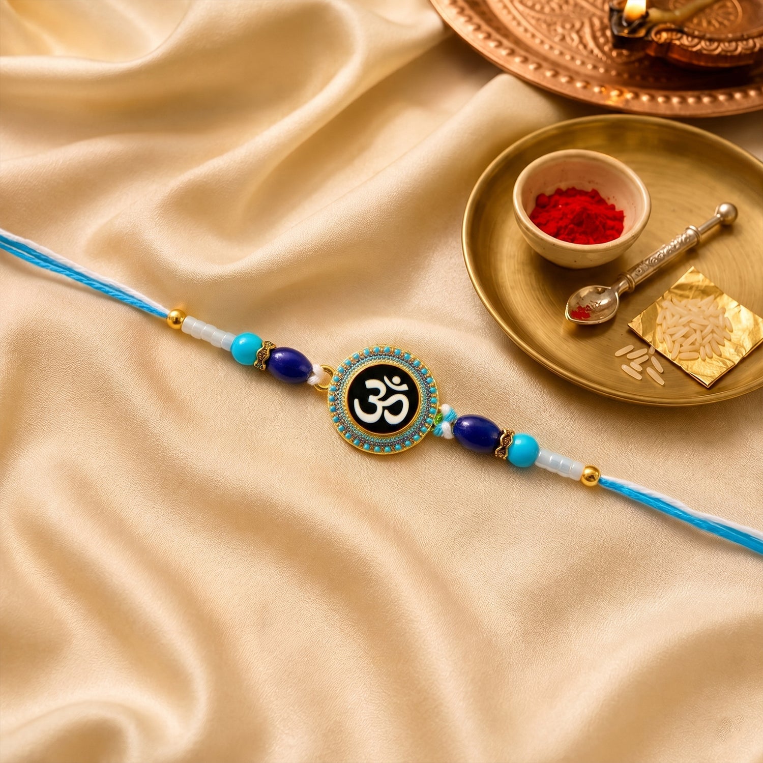 ALVENZA Om Symbol Rakhi – Elegant Beaded Design for Raksha Bandhan