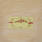 ALVENZA Ganesha Rakhi for Brother - Kundan Golden Finish with Beaded Thread
