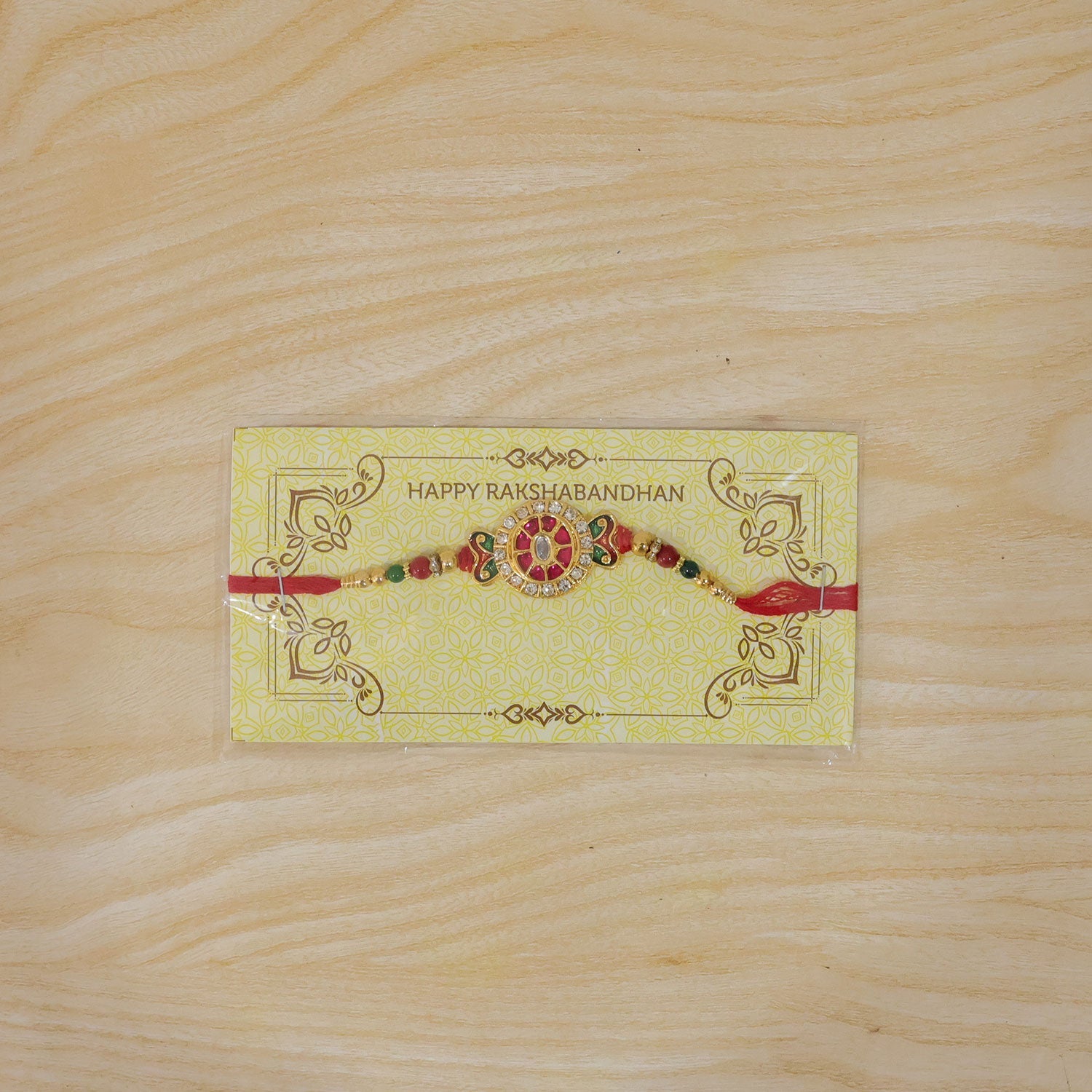 ALVENZA Ganesha Rakhi for Brother - Kundan Golden Finish with Beaded Thread