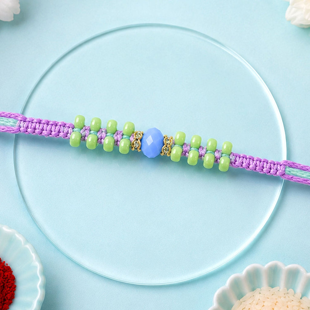 ALVENZA Purple Macrame Bracelet Rakhi with Green Beads, Blue Accent and Playful Thread