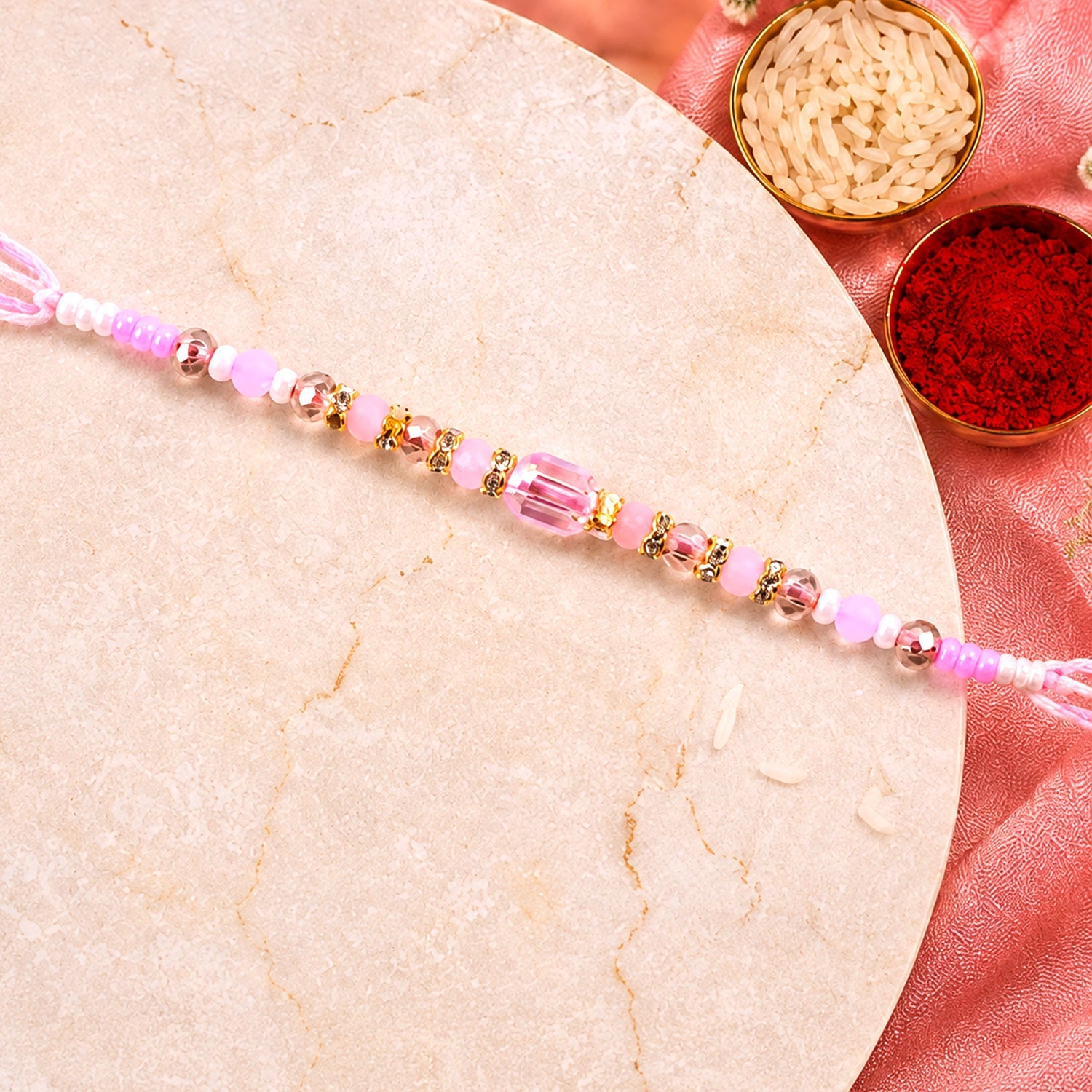 ALVENZA Soft Pearl Beaded Rakhi with Delicate Colors and Beautiful Bracelet Style Finish