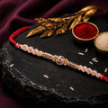 ALVENZA Sparkling Pearl Stone Rakhi with Colorful Thread and Premium Festive Beauty