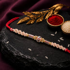 ALVENZA Sparkling Pearl Stone Rakhi with Colorful Thread and Premium Festive Beauty