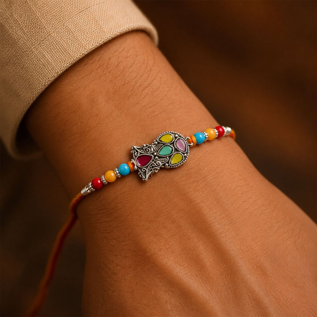 ALVENZA Multicolor Teardrop Leaf Rakhi with Orange Thread, Roli Chawal Coin and Gift Box Packing