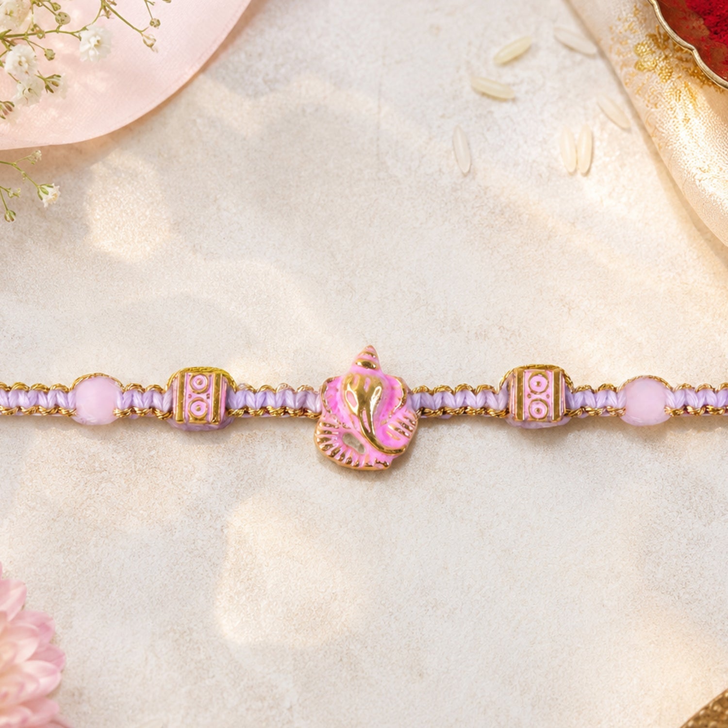 ALVENZA Pink Bracelet Designer Rakhi with Pearl Style Beads and Soft Festive Finish