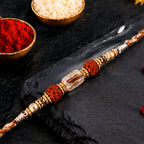 ALVENZA Graceful Pastel Pearl Rakhi with Fine Beads and Premium Raksha Bandhan Charm