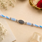 ALVENZA Blue Silver Stone Rakhi with Elegant Bracelet Style and Premium Festive Shine