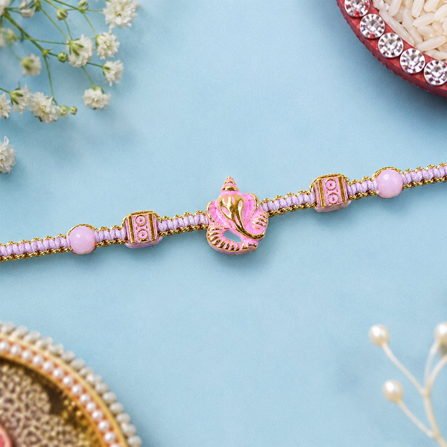 ALVENZA Pink Bracelet Designer Rakhi with Pearl Style Beads and Soft Festive Finish