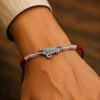 ALVENZA Silver Bhaiya Name Rakhi with Crystal Beads, Red Thread and Sparkling Detail