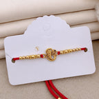 ALVENZA Ganesha Rakhi – Divine Blessings & Traditional Design