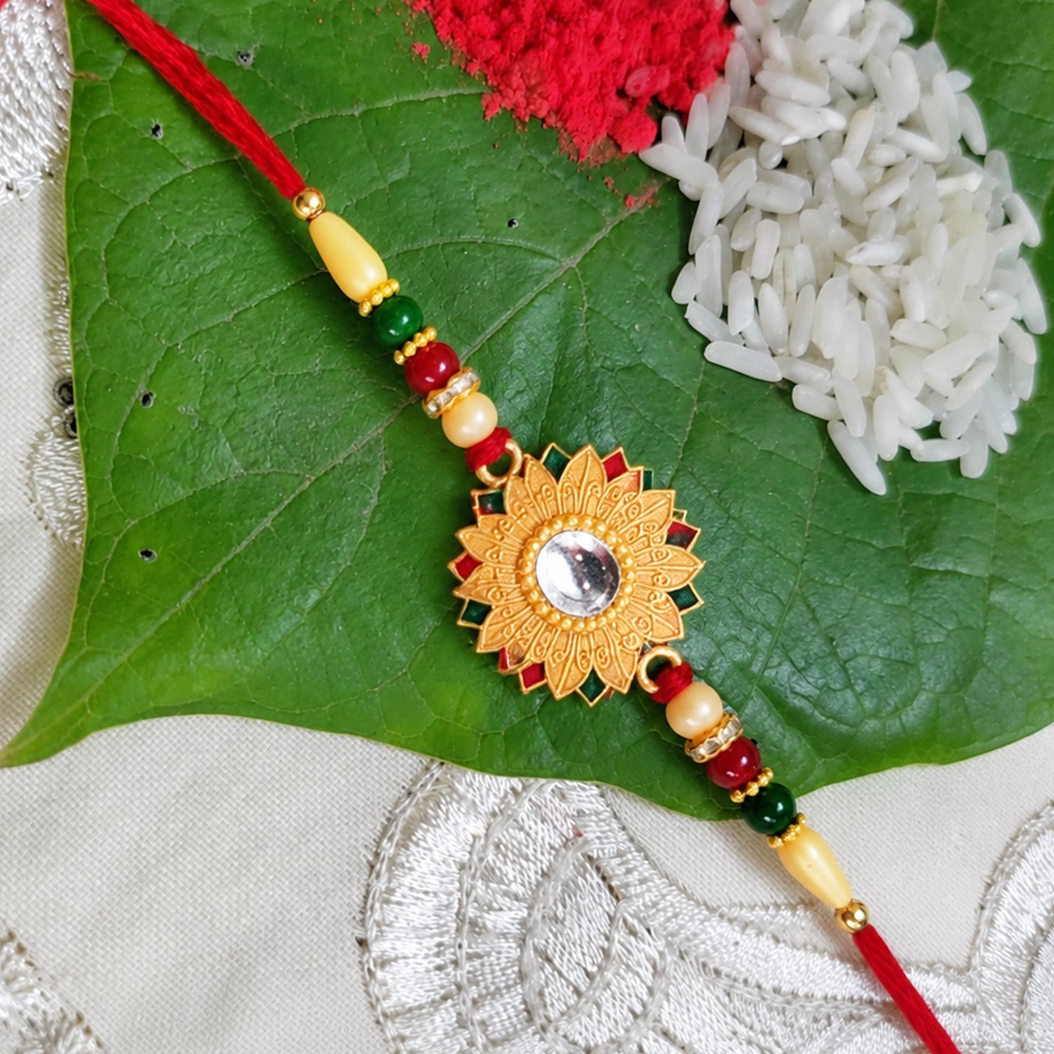 ALVENZA Floral Mirror Rakhi - Elegant Brother Gift for Raksha Bandhan