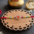 ALVENZA OM Symbol Rakhi – Traditional Beads & Red Thread for Brothers