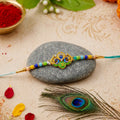 ALVENZA Rakhi – Traditional Colorful Beads and Yellow Thread for Brother