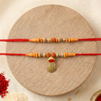 ALVENZA Premium Rudraksha Bead Om Charm Bhabhi Lumba Rakhi – Traditional with Modern Style