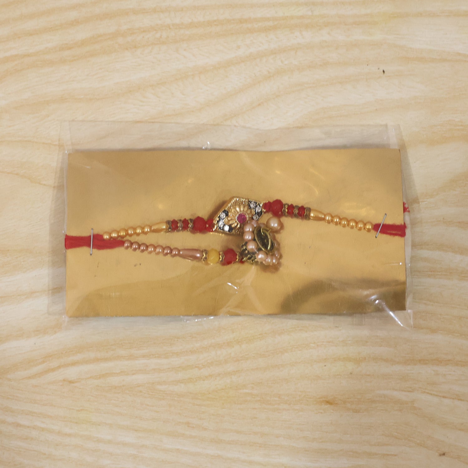ALVENZA Premium Diamond Shape Stone bhabhi Lumba Rakhi – Elegantly crafted with Pearl Jhumka