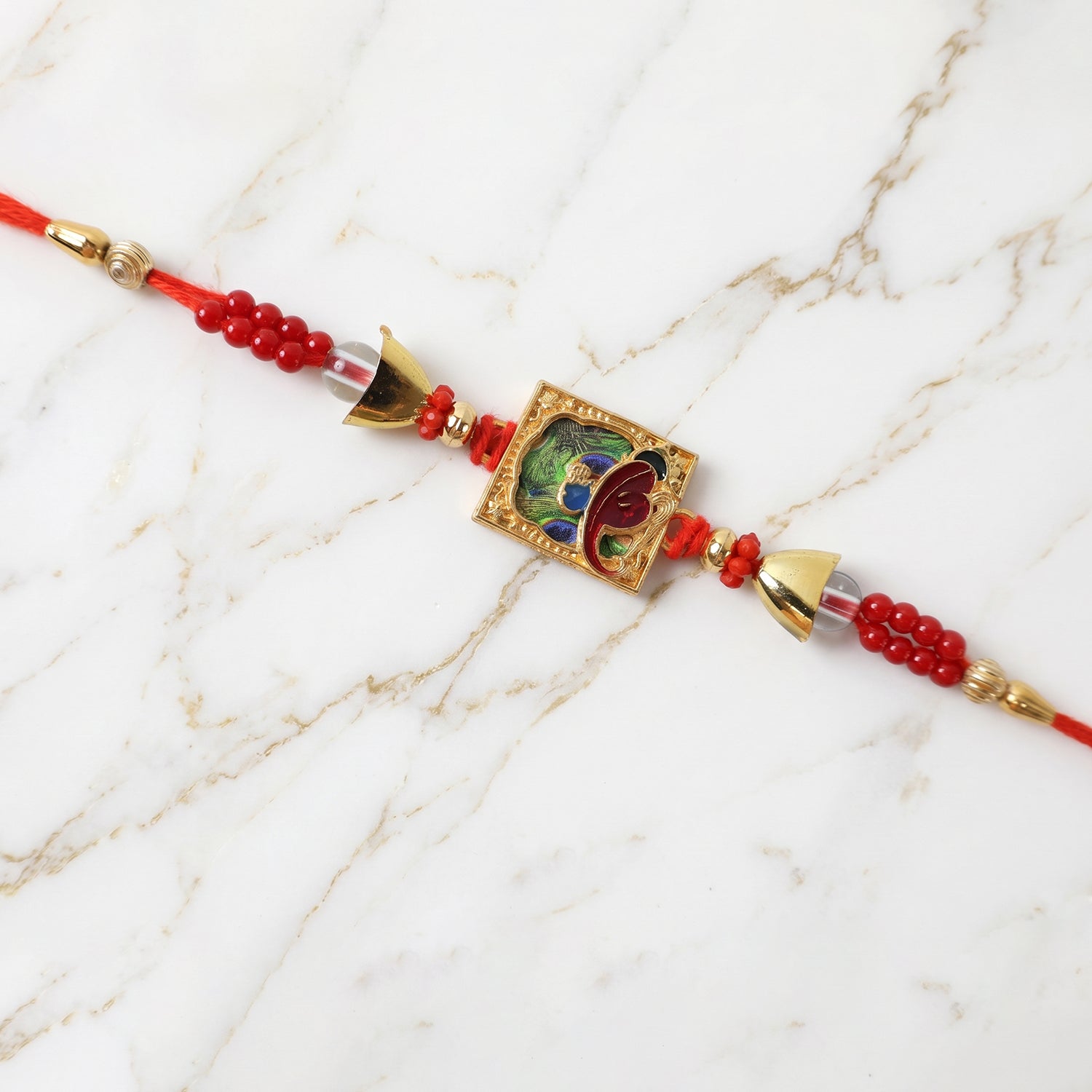 ALVENZA Traditional Square Motif Rakhi – Vibrant Red Beads & Elegant Design