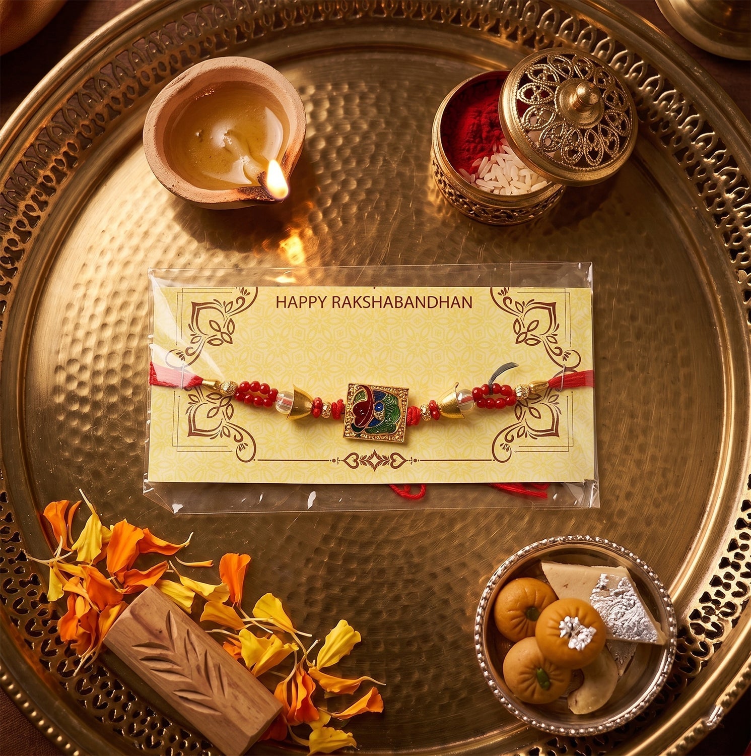 ALVENZA Traditional Square Motif Rakhi – Vibrant Red Beads & Elegant Design