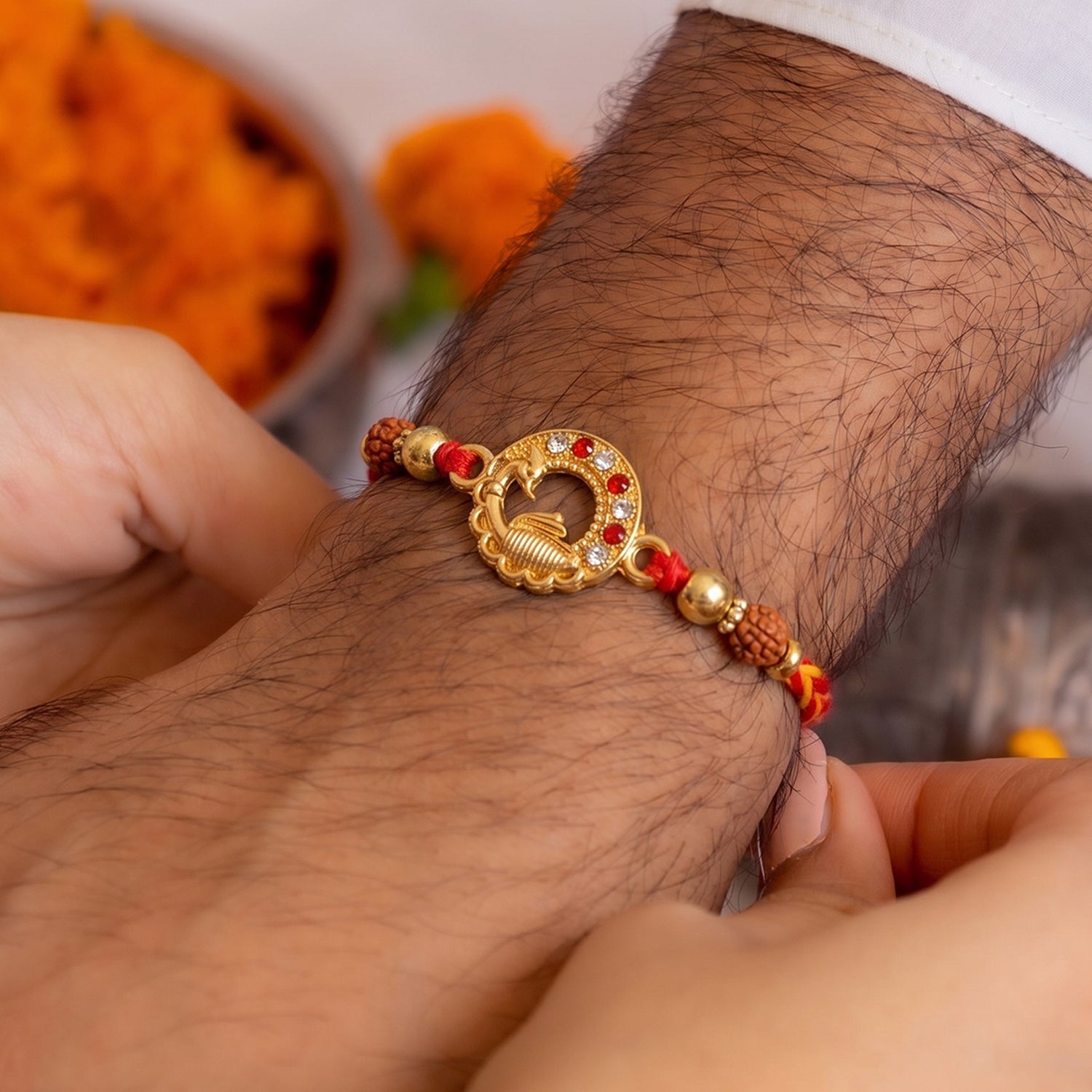 ALVENZA Golden Peacock Rakhi – Elegant Design with Rudraksha Beads for Brothers