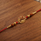 ALVENZA Golden Peacock Rakhi – Elegant Design with Rudraksha Beads for Brothers