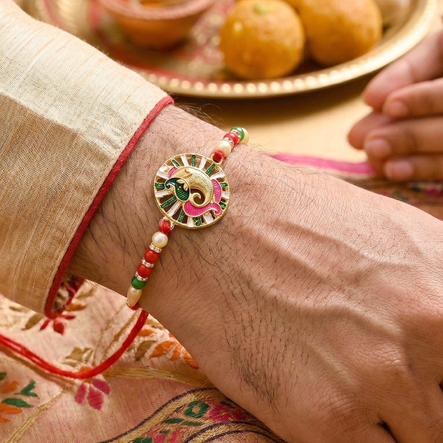 ALVENZA Rakhi – Traditional Thread with Colorful Beads & Ganesh Motif