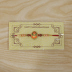 ALVENZA Ganesh Design Rakhi – Elegant Rudraksha Beads for Raksha Bandhan