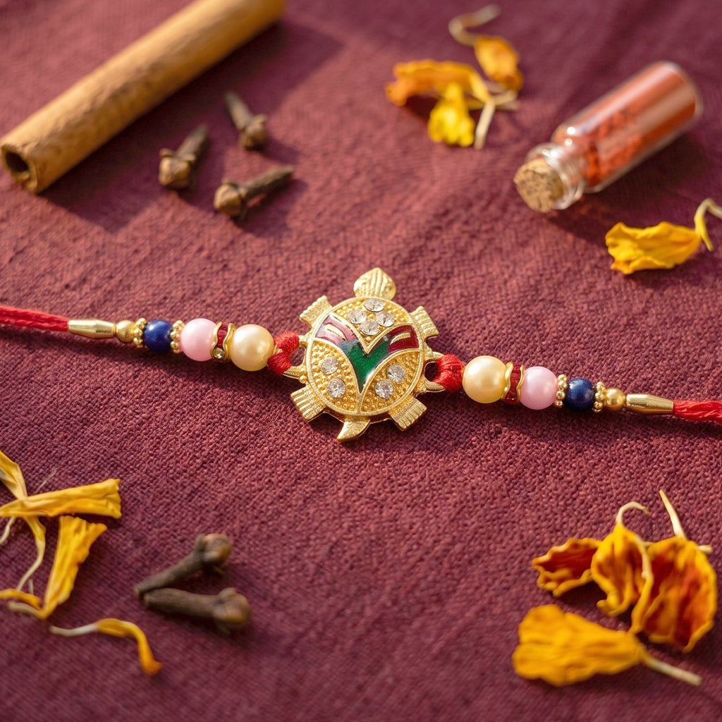ALVENZA Golden Turtle Rakhi – Elegant Pearl Beads & Soft Thread for Raksha Bandhan
