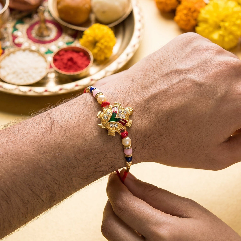 ALVENZA Golden Turtle Rakhi – Elegant Pearl Beads & Soft Thread for Raksha Bandhan