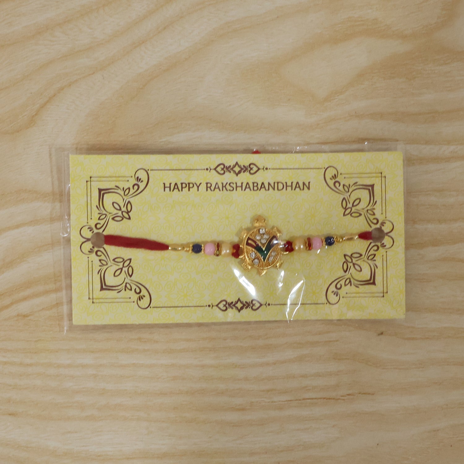 ALVENZA Golden Turtle Rakhi – Elegant Pearl Beads & Soft Thread for Raksha Bandhan
