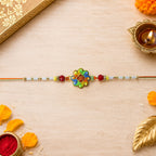 ALVENZA Colorful Om Rakhi – Vibrant Beaded Traditional Thread