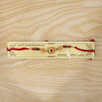 ALVENZA Shop Gold Stone Rakhi with Colourful Beads for Brothers
