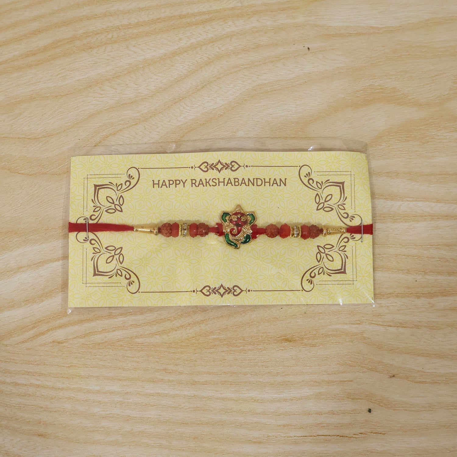 ALVENZA Ganesh Rudraksha Beads Rakhi – Traditional Blessing Gift for Brothers