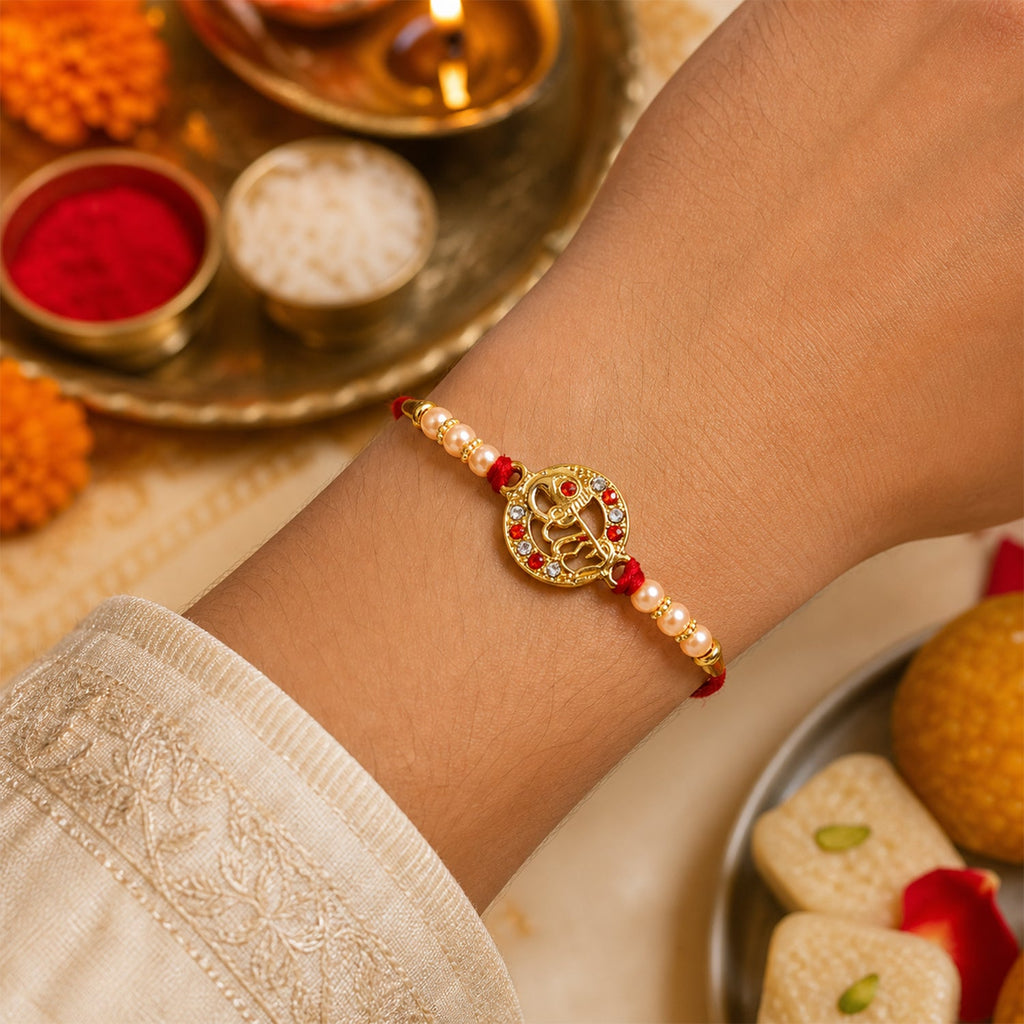 ALVENZA Rakhi – Elegant pearl bead design with red thread for siblings