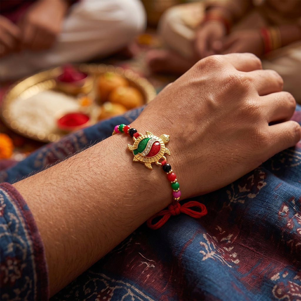 ALVENZA Rakhi – Elegant Turtle Design with Stone Work & Red Thread