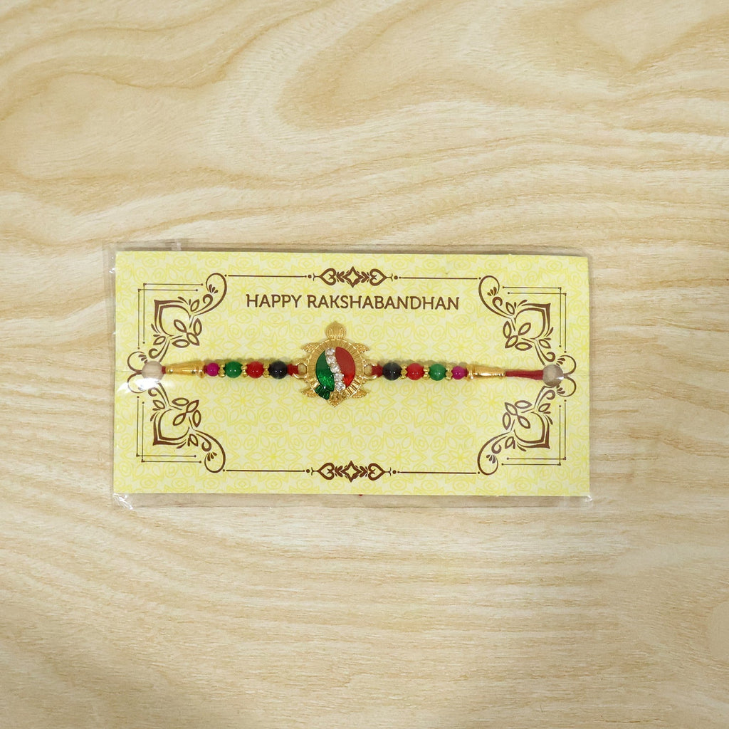ALVENZA Rakhi – Elegant Turtle Design with Stone Work & Red Thread