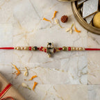ALVENZA Rakhi – Traditional Damru Trishul Beaded Design for Raksha Bandhan