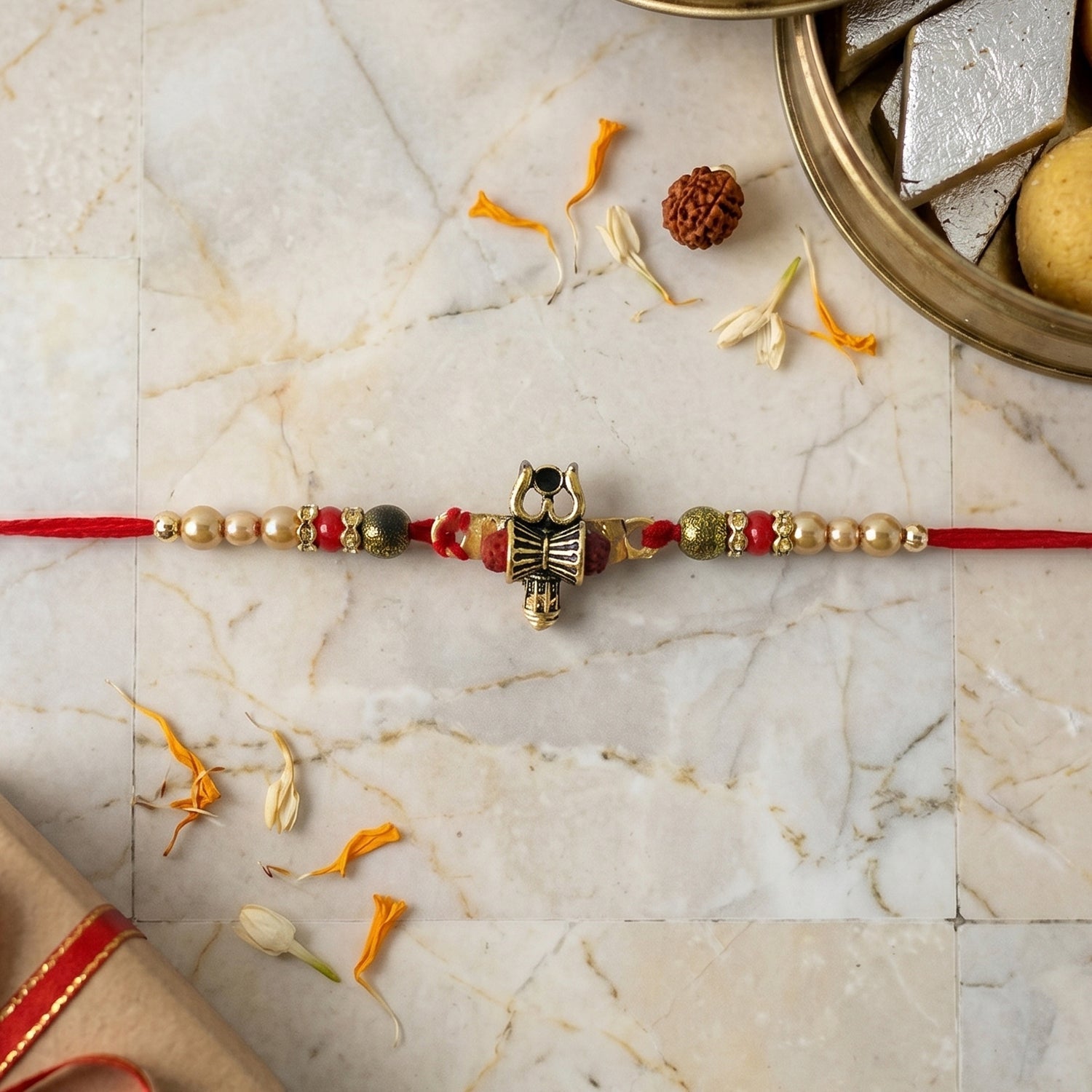 ALVENZA Rakhi – Traditional Damru Trishul Beaded Design for Raksha Bandhan