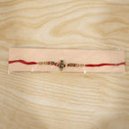 ALVENZA Rakhi – Traditional Damru Trishul Beaded Design for Raksha Bandhan