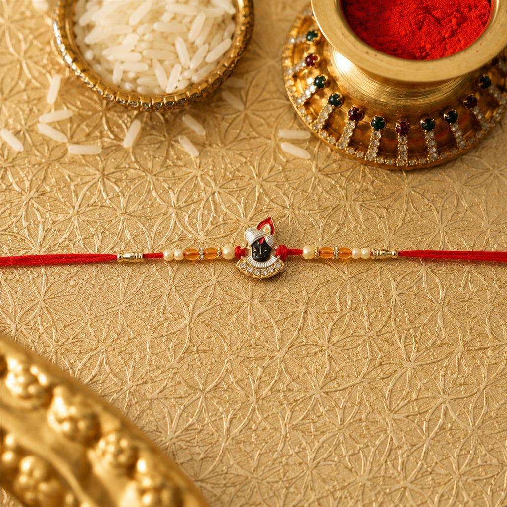 ALVENZA Rakhi – Elegant Pearl Beads & Red Thread for Brothers