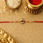 ALVENZA Rakhi – Elegant Pearl Beads & Red Thread for Brothers
