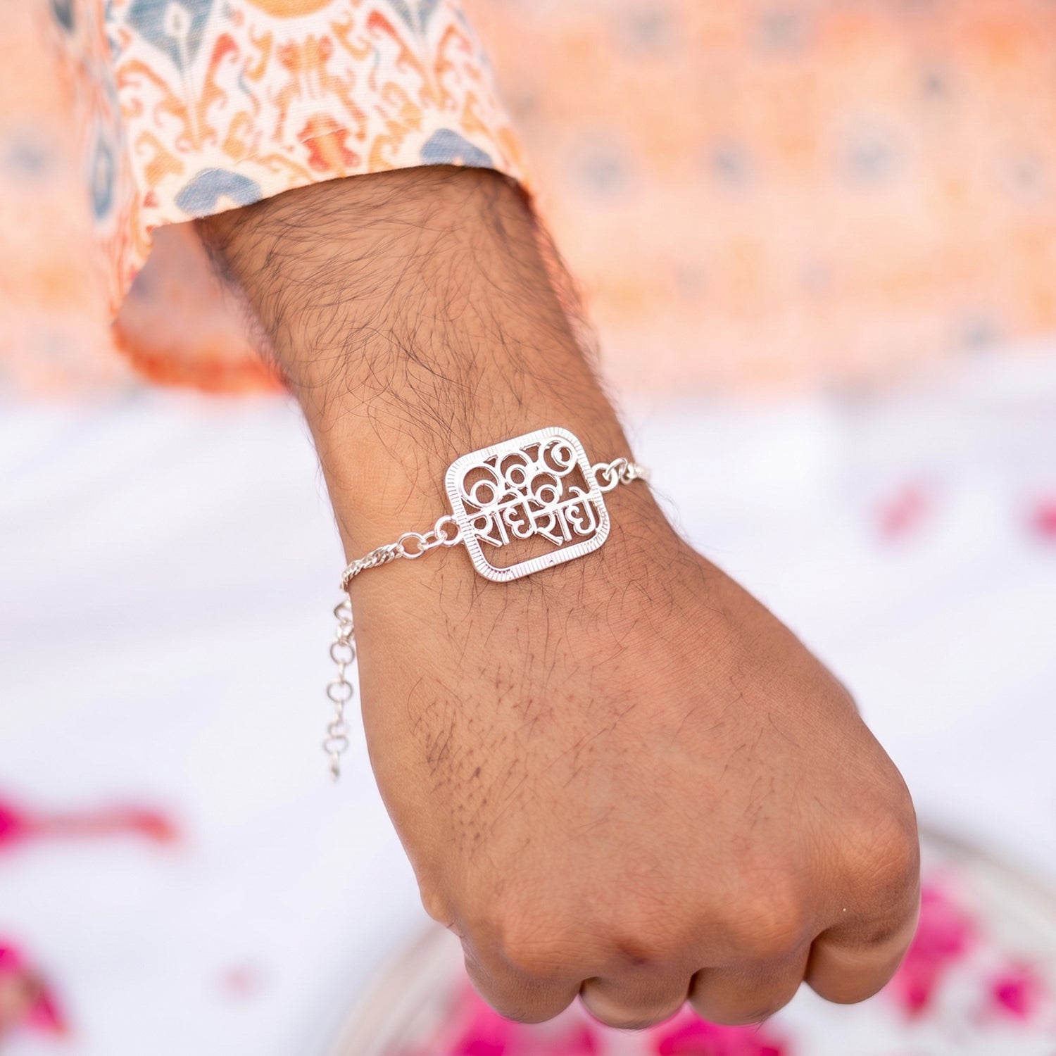 ALVENZA Silver Radhe Radhe Rakhi – Elegant & Spiritual Design for Brothers