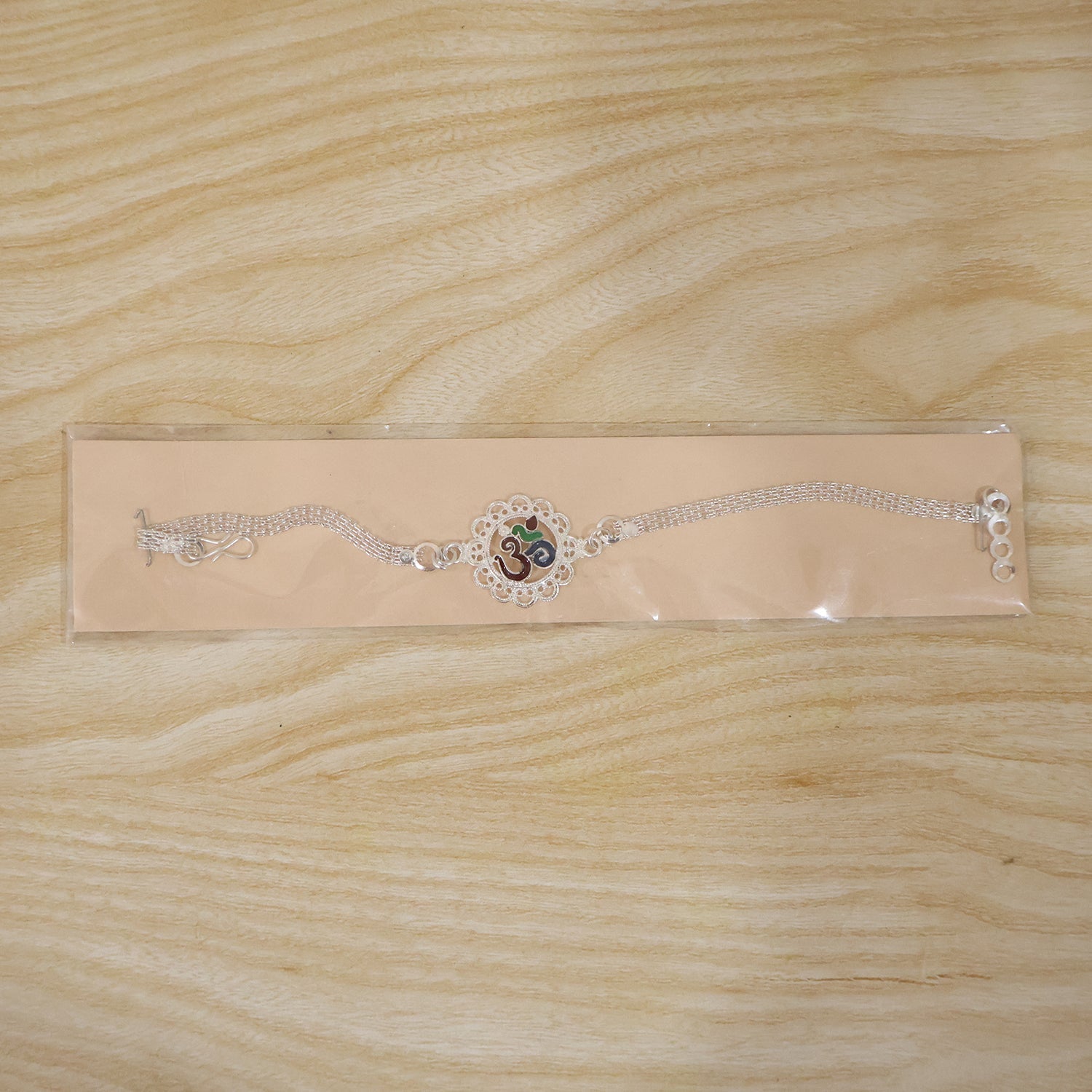 ALVENZA Silver Om Chain Rakhi – Elegant & Meaningful Festival Gift