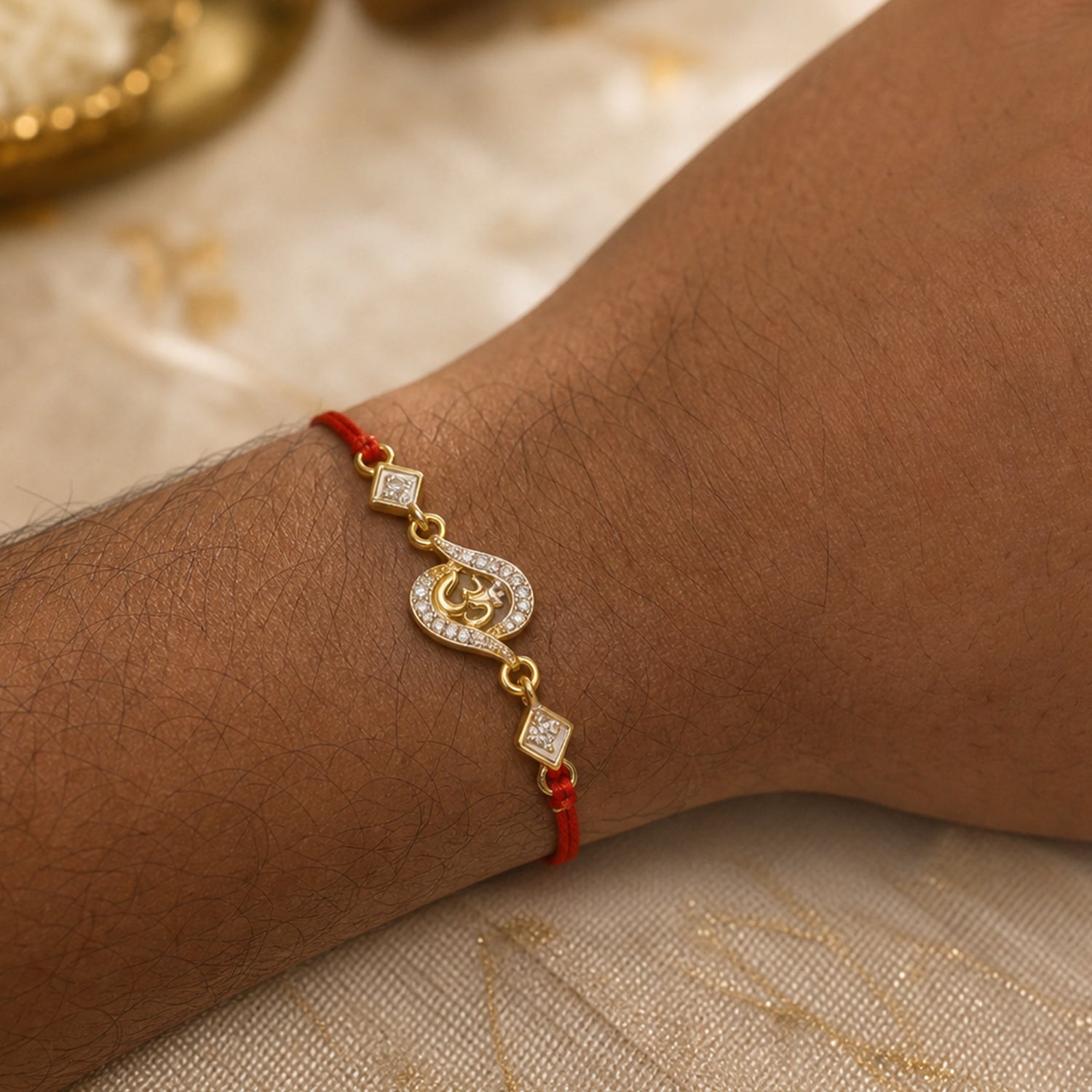 ALVENZA Om Rakhi – Elegant Stone Work & Red Thread for Raksha Bandhan