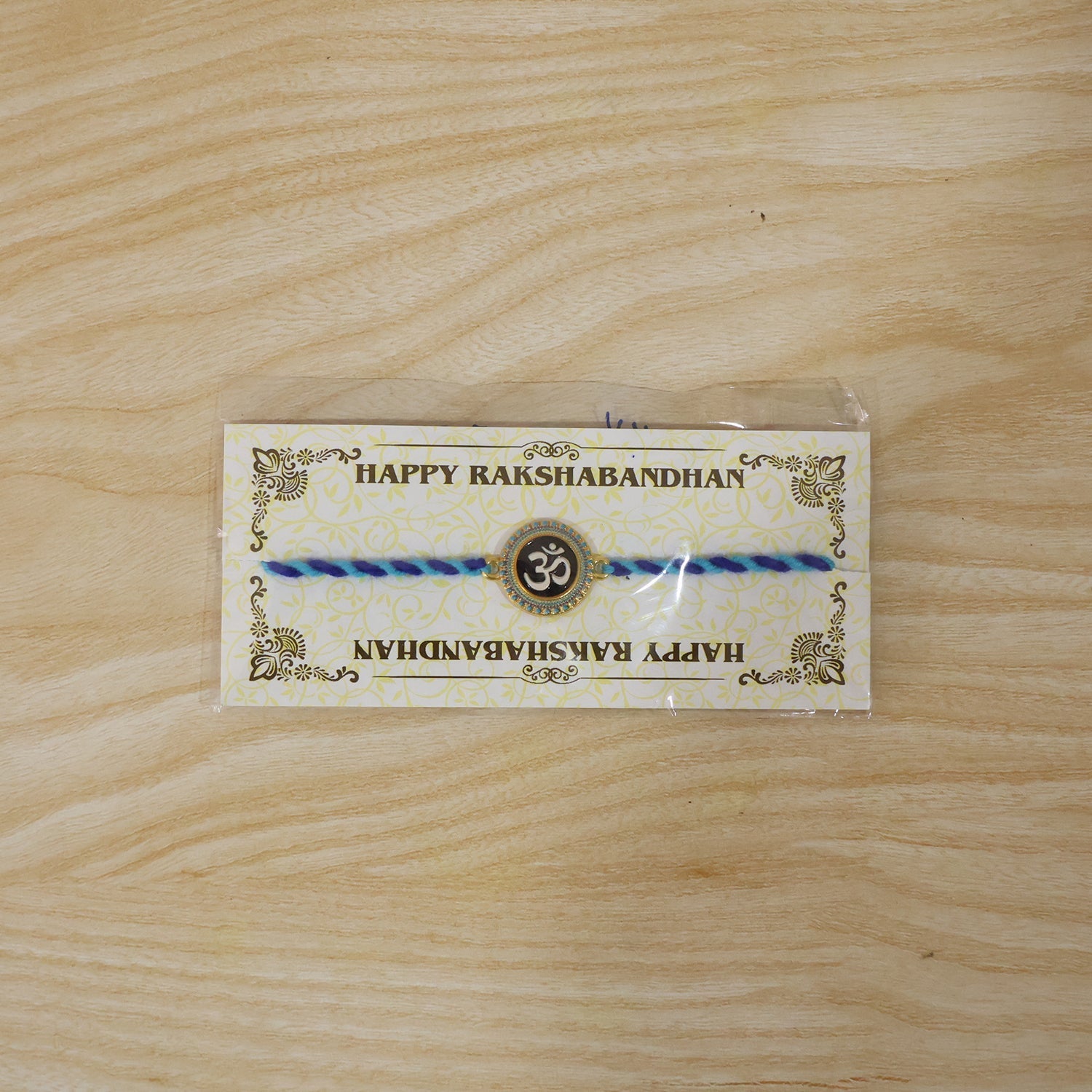 ALVENZA Om Rakhi – Elegant Blue Dori for Brothers on Raksha Bandhan