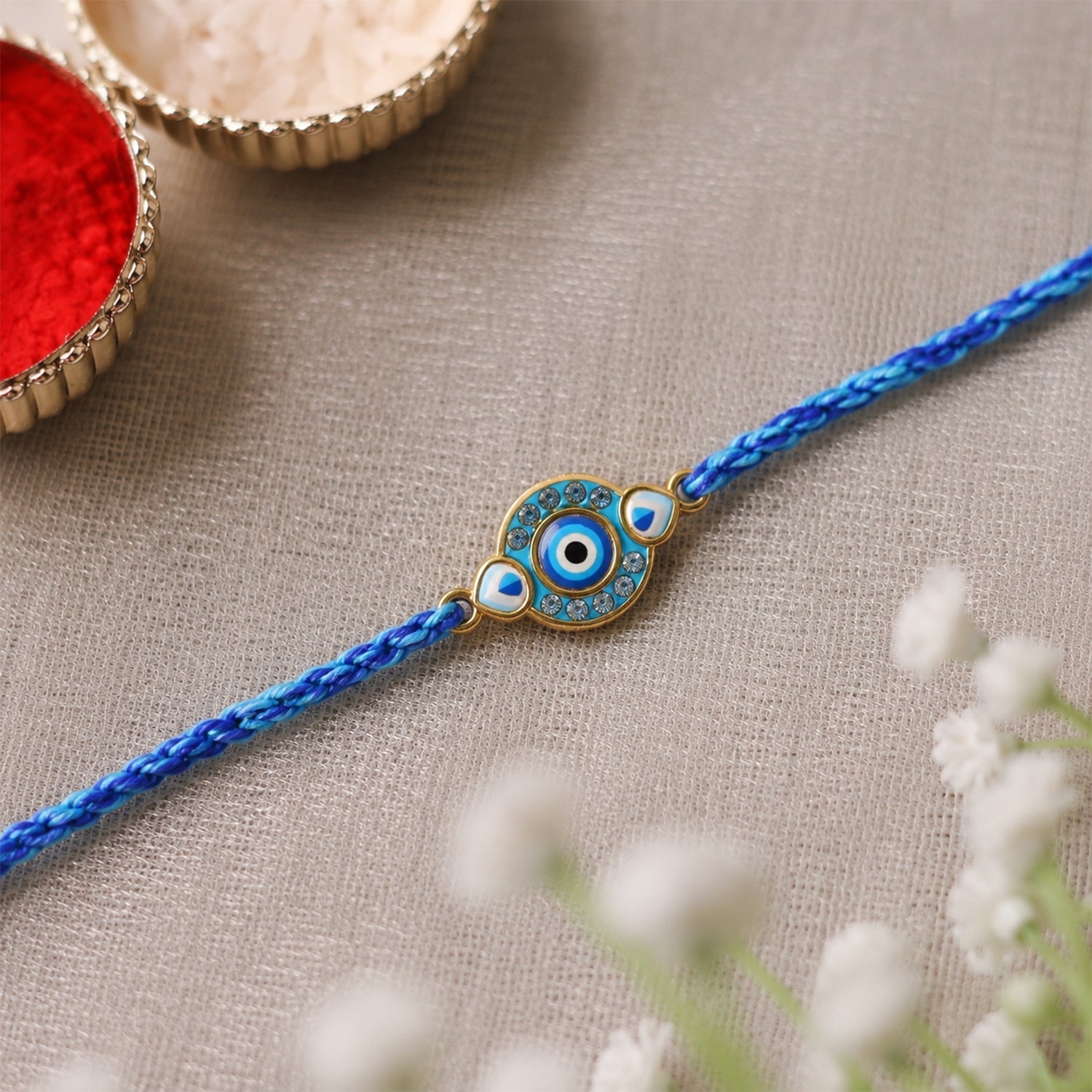 ALVENZA Blue Evil Eye Rakhi – Stylish and Protective for Raksha Bandhan
